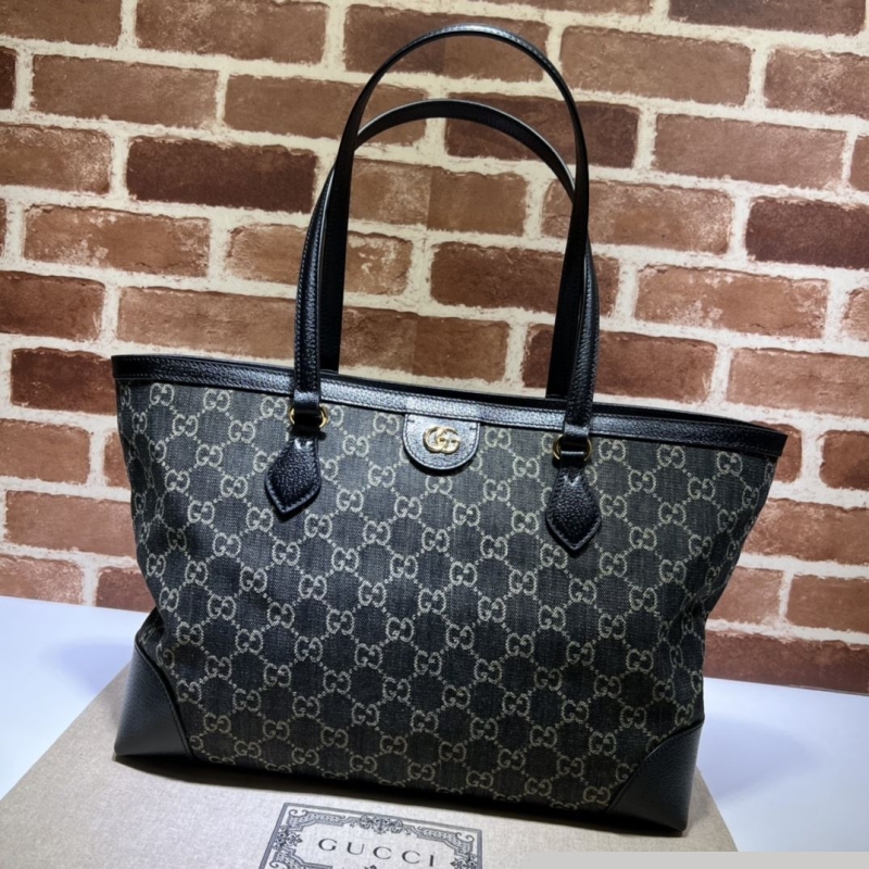 G*u*i shopping bags